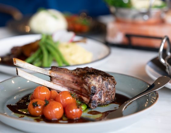 A roasted rack of lamb with blistered cherry tomatoes is served for dinner at the Kalgoorlie Plaza Hotel